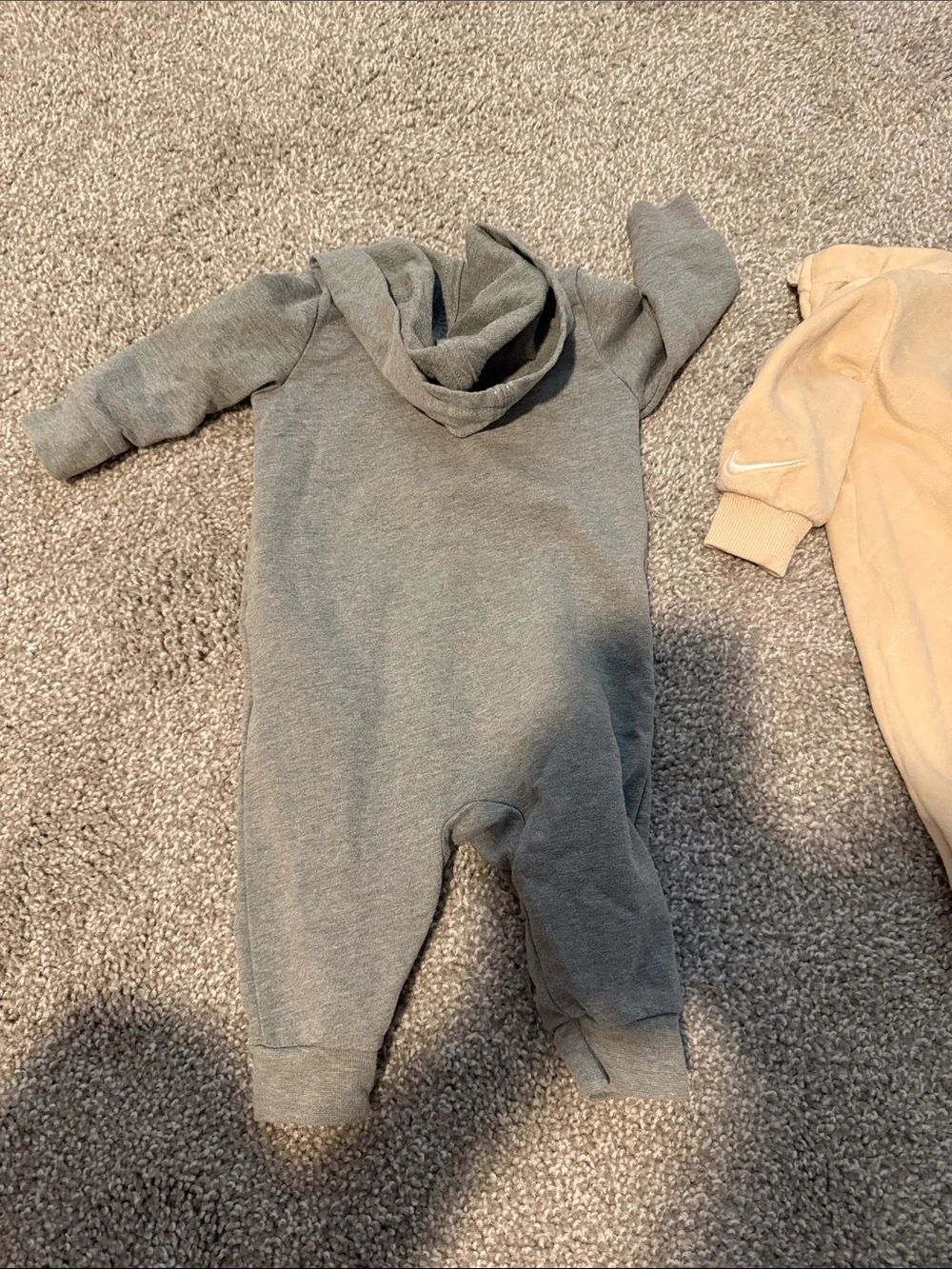 TWO Nike baby 3M onesies